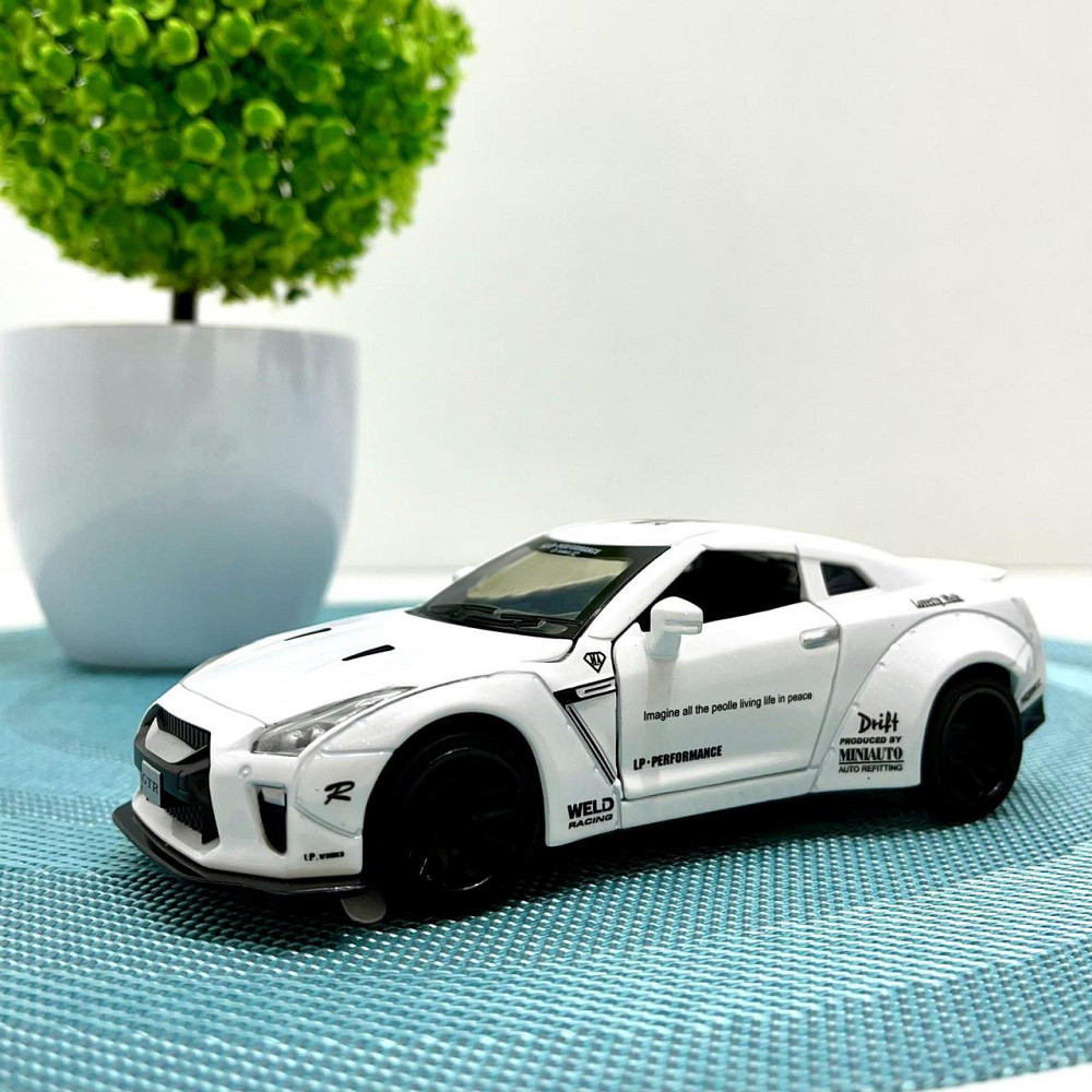 Машинка TK Union Nissan GTR Auto Expert металева, світло, звук, інерційна Біла (38071) Чернігів - фото 1