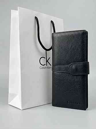 Чоловічий довгий шкіряний гаманець на кнопці Calvin Klein (1342) Київ