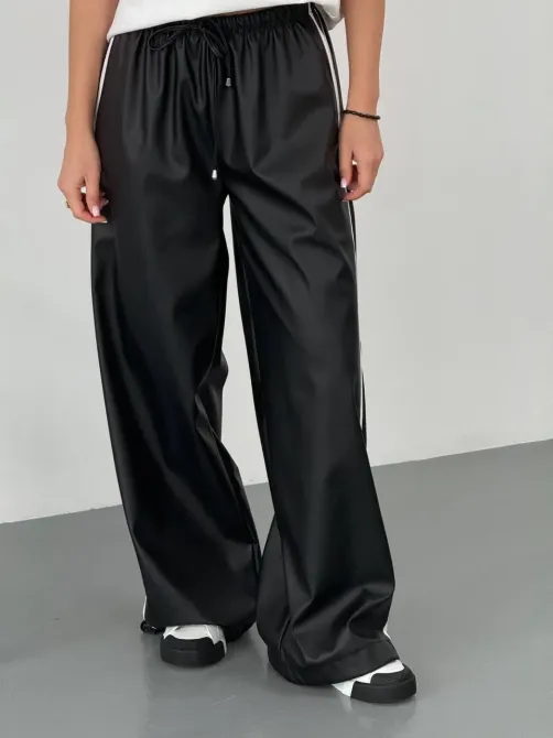 Жіночі теплі шкіряні штани з лампасами на флісі знизу з затяжками Харків - фото 4