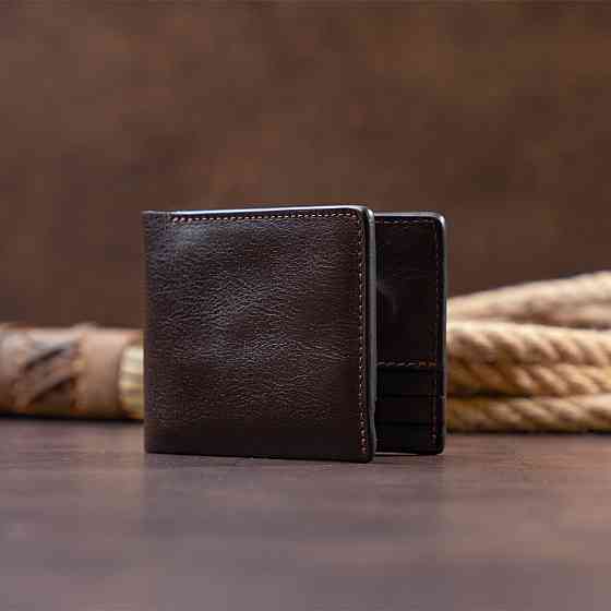 Якісне портмоне в гладкій шкірі на магнітах GRANDE PELLE 11307 Коричневе Київ