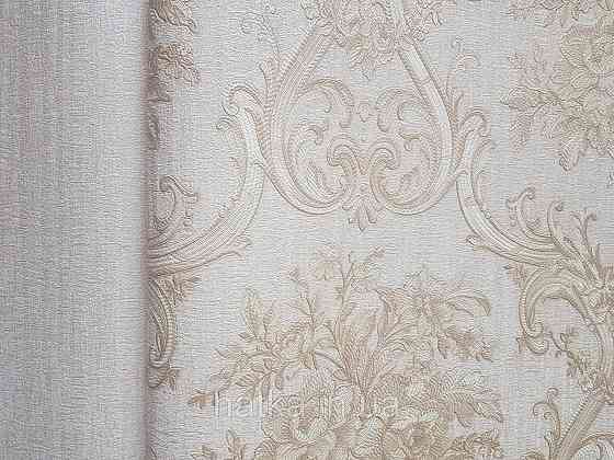 Шпалери вінілові на флізеліні AdaWall Seyyah 1.06х10 квіти в горщику вензеля структурні золотисті на кремовому Київ