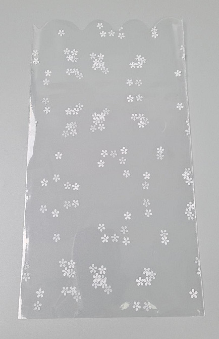 Пакет із малюнком для пакування подарунків (15*30) No380(2) (ажурний) "Ромашка" (100 шт.) Харків - фото 1