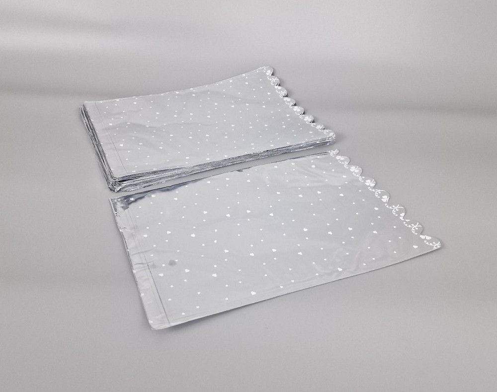 Пакет із малюнком для пакування подарунків (25*40) No427 (5) фольгований (ажурний) "Сердечка" (100 шт.) Харків - фото 2