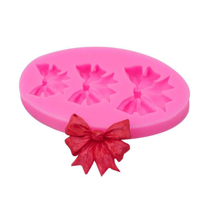 Молд силіконовий Бантики 50 на 85 мм рожевий Київ - фото 9