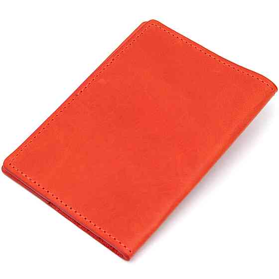 Яскрава шкіряна обкладинка на паспорт GRANDE PELLE 11483 Червоний Київ