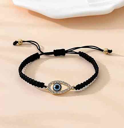Браслет на чёрном шнурке с подвеской глаз Киев