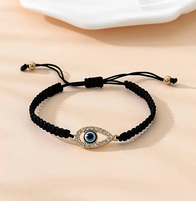 Браслет на чёрном шнурке с подвеской глаз Киев - изображение 1
