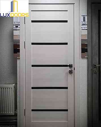 Двери FLORA Лиственница белая Полотно, покрытие eco-tex Киев