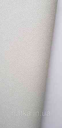 Шпалери вінілові на флізеліні A.S.Creation UNITA 1.06x10 однотонні матові структурні світло-зелені Київ