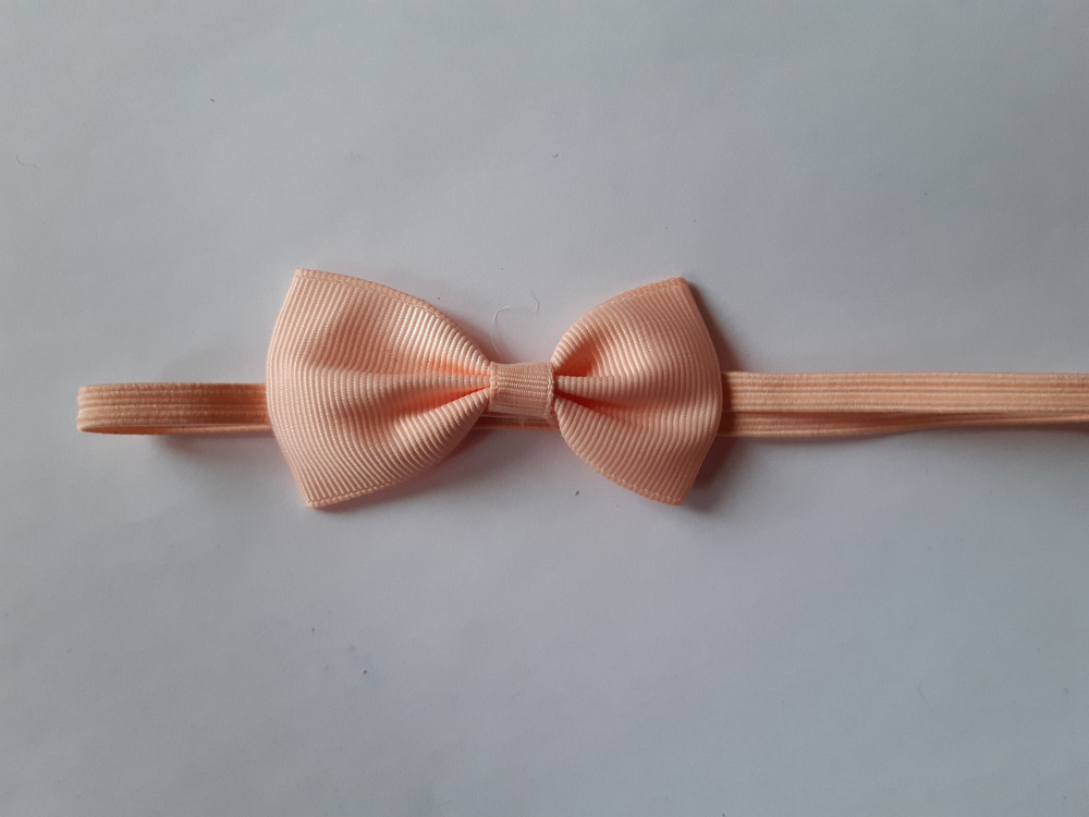 Дитяча повязочка на голову персикова - розмір універсальний (на резинці), бантик 7см Київ - фото 1