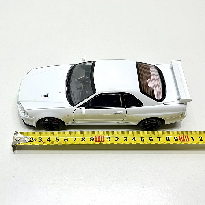 Машинка металева Авто Експерт Nissan GT-R 1:24 світло/звук відчиняються двері капот багажник Біла (1990-21) Чернігів - фото 6