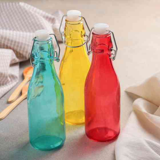 ПЛЯШКА СКЛЯНА ДЛЯ НАПОЇВ З БУГЕЛЬНОЮ ПРОБКОЮ КАЛЕЙДОСКОП 1 Л 32 СМ (ШТ) 6275 ABA-OPT Одеса