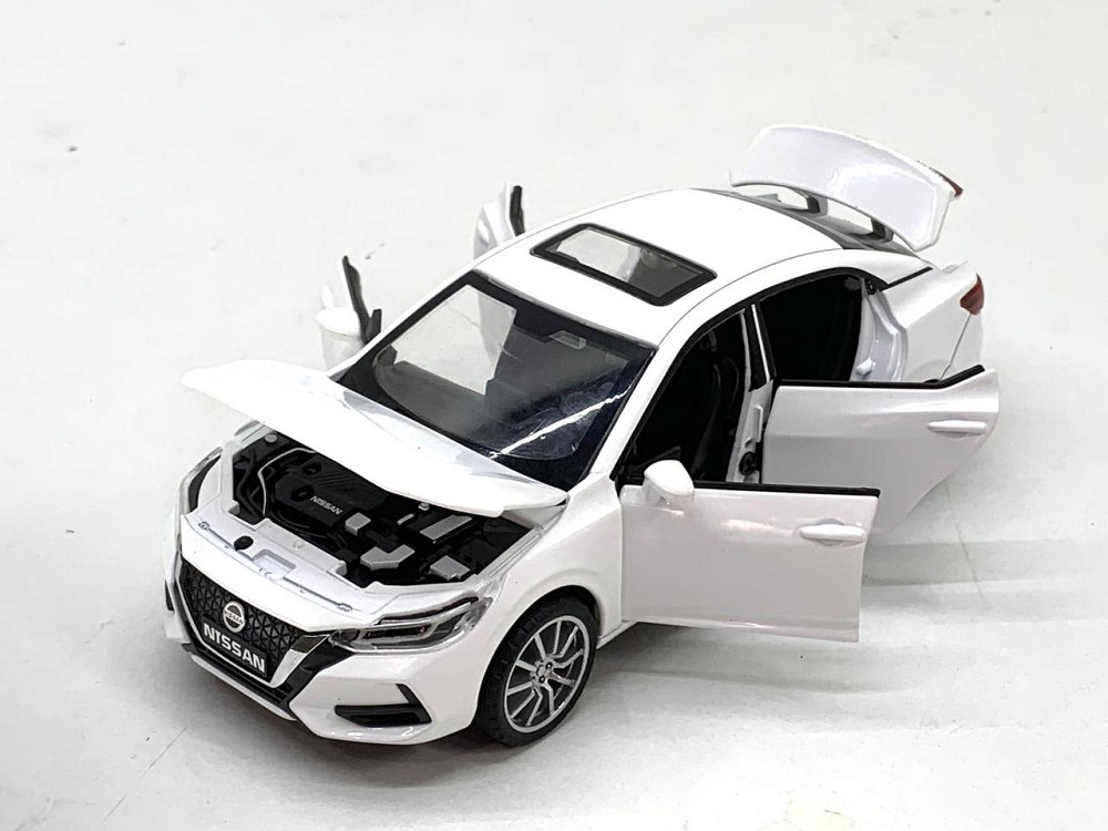 Машина Автосвіт Nissan selfie інерційна масштаб 1:32 відчиняються двері капот багажник 15 см Біла (AP-2084) Чернігів - фото 4