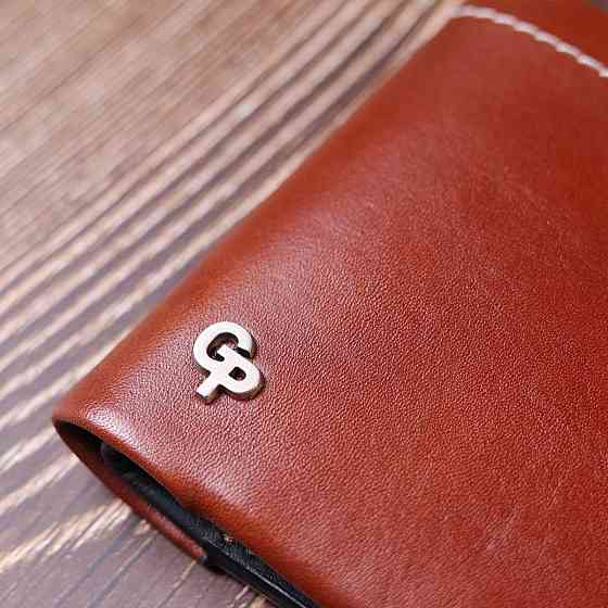 Чудовий шкіряний чоловічий гаманець Коричневий (GRANDE PELLE) Київ