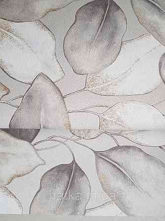 Обои виниловые на флизелиновой основе Rasch Incanto 1.06х10 листья крупные белые светло серые золотистые Киев