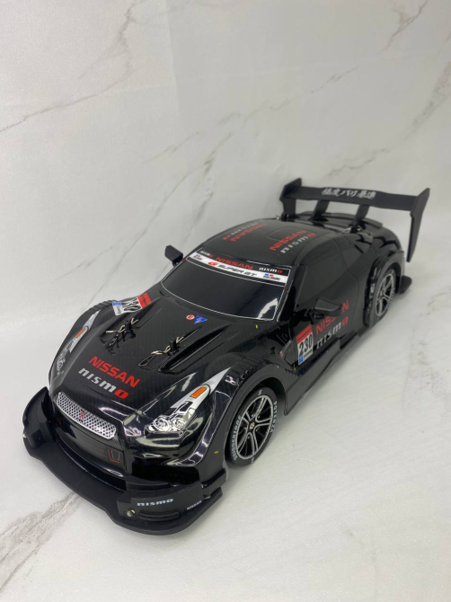 Машинка для дрифту Nissan GT-R R/C 4WD (1:16): Неонове підсвічування, 2 швидкості, 2.4 ГГц, Чорний Б/В Київ - фото 1
