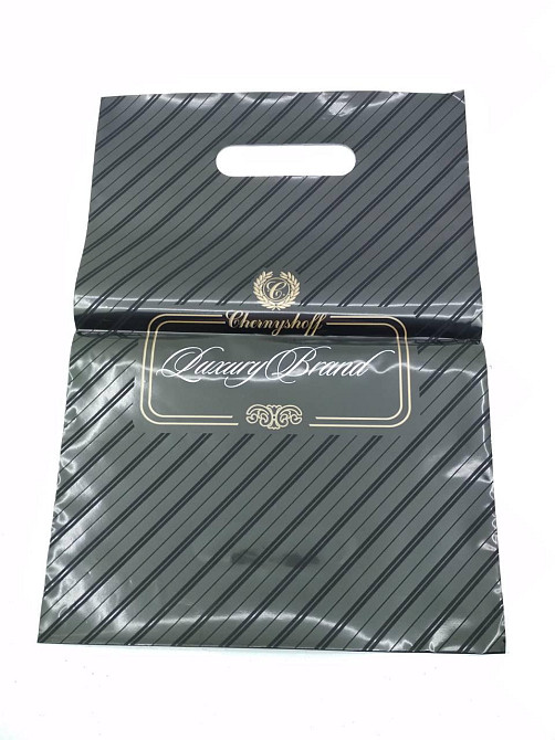 Пакети з вирубаною ручкою (22*30)п "Лакшері" Рендпако (50 шт.) Харків - фото 1