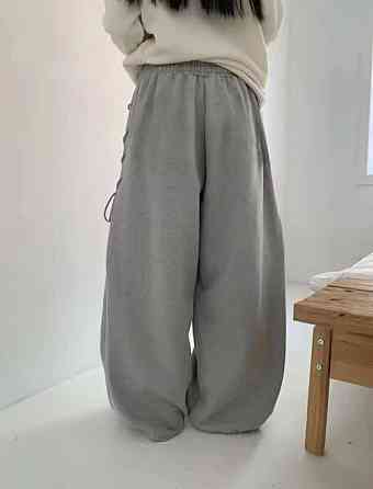 Женские очень широкие оверсайз брюки с акцентной шнуровкой по бокам Одесса