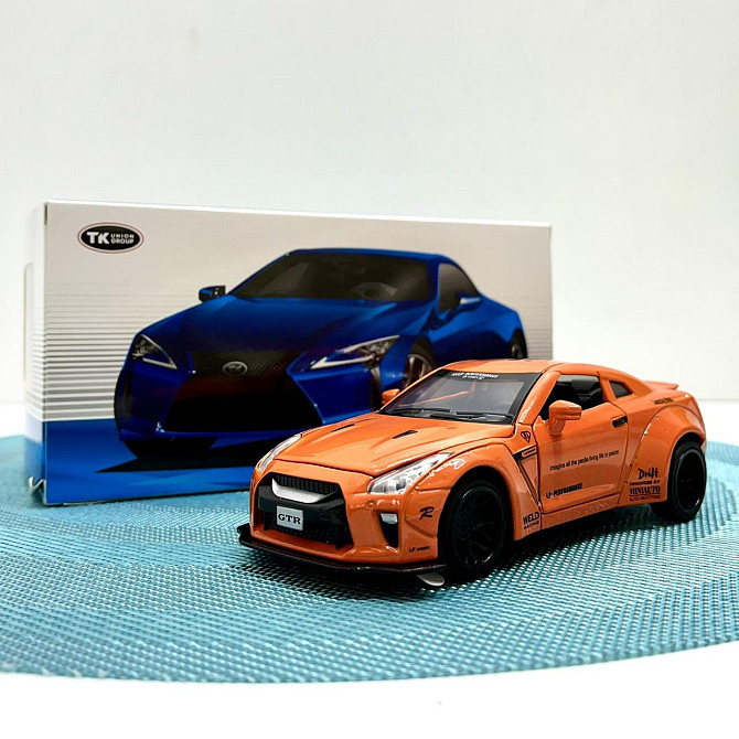 Машинка Auto Expert Nissan GTR металева 1:32 світло/звук/інерційна Жовтогаряча (38071) Чернігів - фото 10