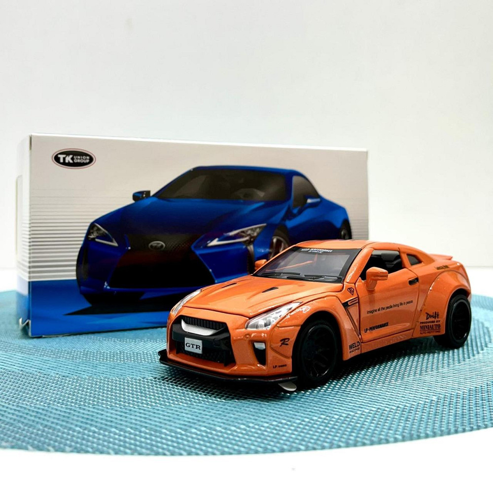 Машинка Auto Expert Nissan GTR металева 1:32 світло/звук/інерційна Жовтогаряча (38071) Чернигов - изображение 10