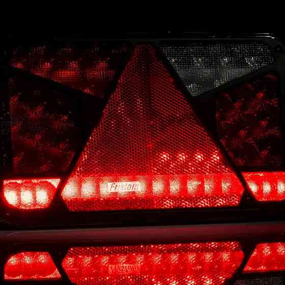 Фонарь прицепа задний с треугольным отражателем левый грузового Мукачево