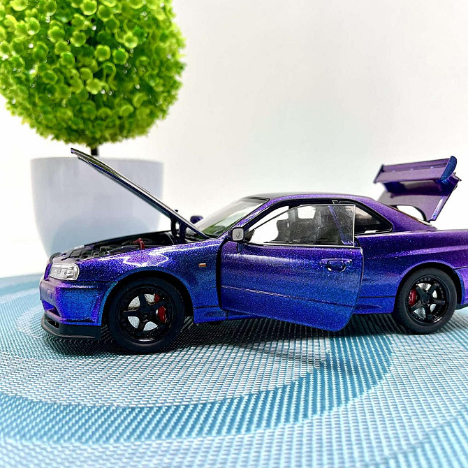 Машинка металева Авто Експерт Nissan GT-R 1:24 світло/звук відчиняються двері капот багажник Фіолетова (1990-21) Чернігів - фото 9