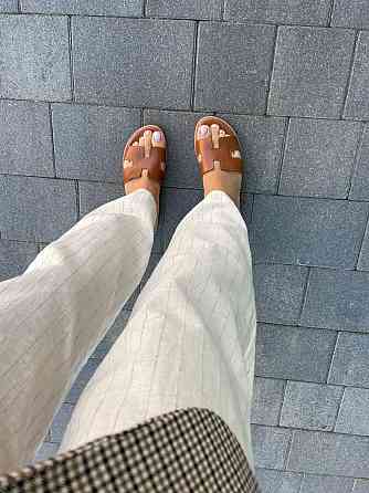 Dino Vittorio Зручні жіночі шкіряні коричневі шльопанці на низькій підошві Dino Vittorio 102-50 Коломыя