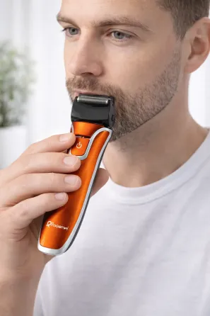 Электрическая аккумуляторная мужская электробритва GM 7725 для бороды с дополнительным лезвием Коломия