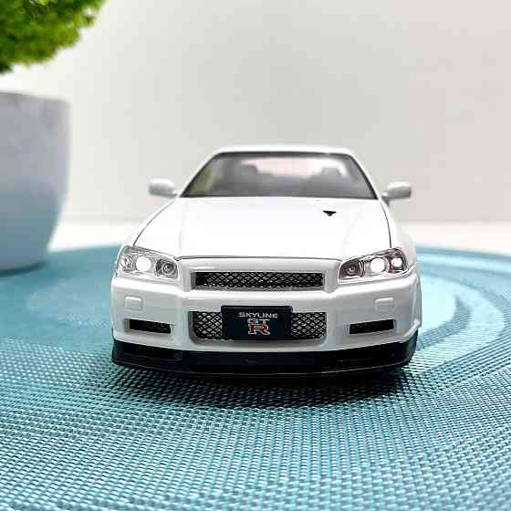 Машинка металева Авто Експерт Nissan GT-R 1:24 світло/звук відчиняються двері капот багажник Біла (1990-21) Чернігів