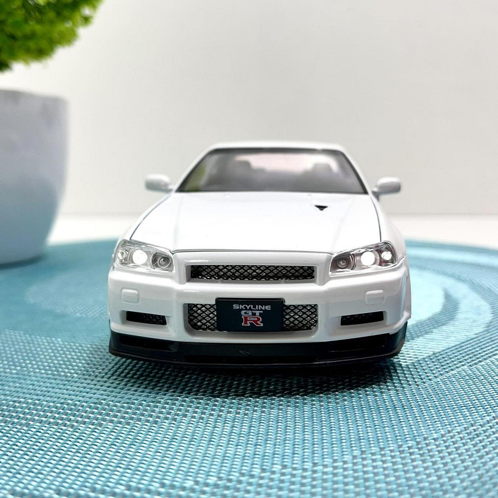 Машинка металева Авто Експерт Nissan GT-R 1:24 світло/звук відчиняються двері капот багажник Біла (1990-21) Чернигов - изображение 3