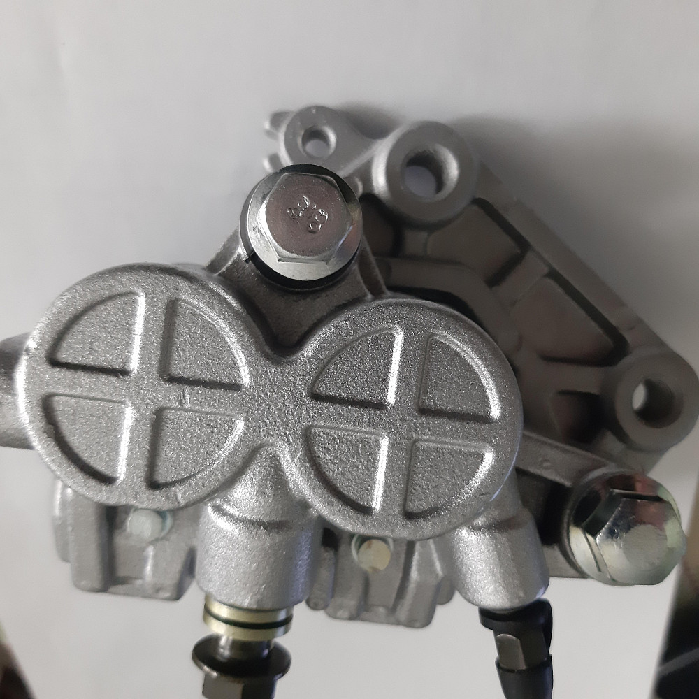 Супорт гальмівний (РТЦ) Zongshen, Lifan 125/150 (передній двопоршневий) CAOKO Київ - фото 1