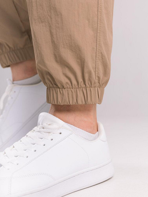 Чоловічі штани джогери з плащівки бежеві з кишенями Pobedov Ground Київ - фото 6