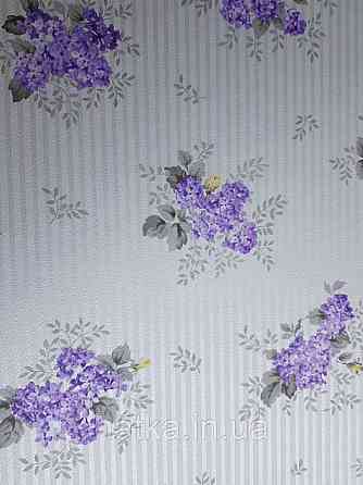 Шпалери вінілові на флізеліні Petite Fleur 4 Rasch Texti 288932 квіти бузок на білому тлі Київ