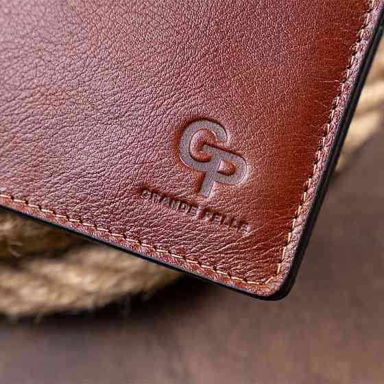 Горизонтальне портмоне в гладкій шкірі на магнітах GRANDE PELLE 11308 Коричневе Київ