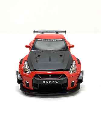 Машинка металева Авто Експерт Nissan Gtr 1:24 світло/звук Червона (GT-1502) Чернігів
