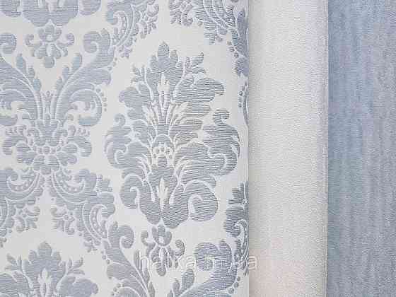 Шпалери вінілові на флізеліні Rasch Trianon Xlll 0.53х10 класика структурні вензелю завитки блакитні на білому Київ