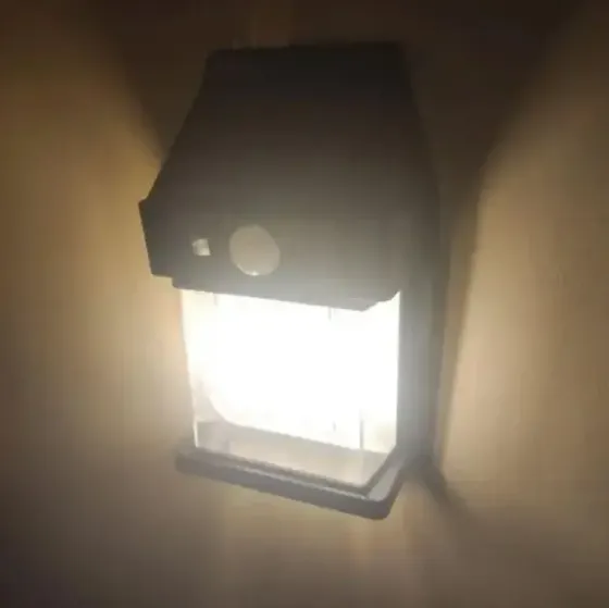 Настенный уличный светильник с солнечной панелью, фонарь с датчиком на движение SOLAR WALL LAMP YX-777 Black Коломия