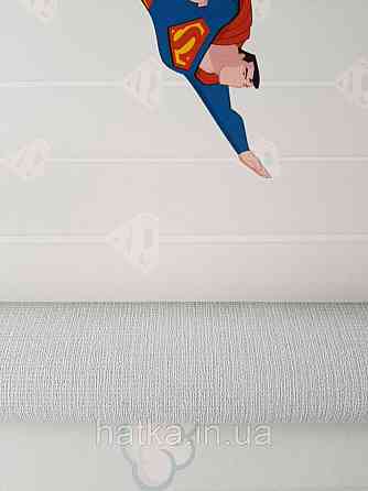 Шпалери вінілові на флізеліні AdaWall Ada Kids метрові дитячі супермен синій на блакитному тлі Київ