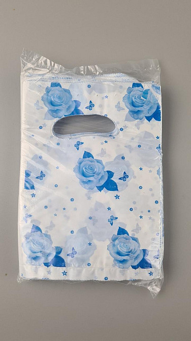 Пакети з вирубаною ручкою (15х20) "Рожечки" блакитні (100 шт.) Харків - фото 1