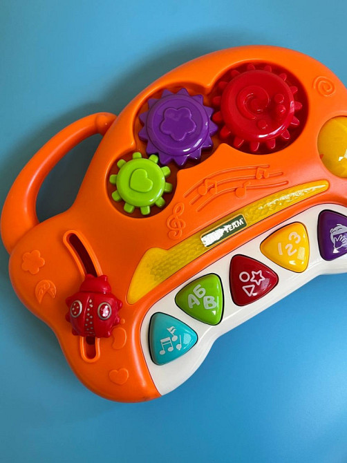 Детская музыкальная игрушка 