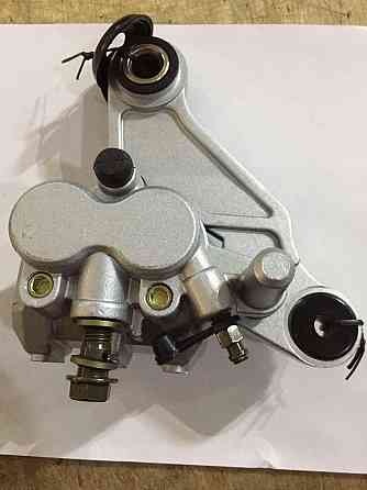 Суппорт тормозной (дисковый) скутер 4 Т китай 50/150 (задний двухпоршневой) Мукачево