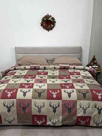 Ecotton Комплект постільної білизни Ecotton Сімейний 150х215 см Оленi на червоному новорічний Киев