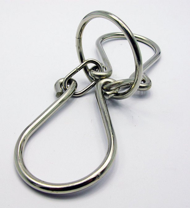 Головоломка металева з кільцями Київ - фото 1