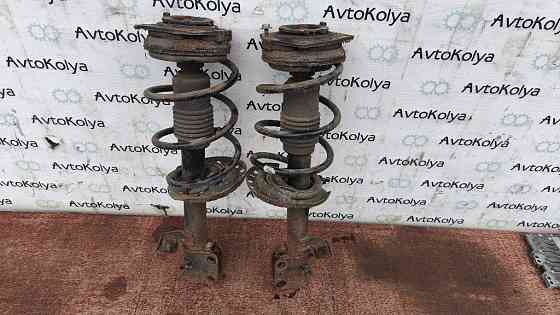 Амортизатор передній (стійка) Nissan Note E11 2005-2012 Ковель