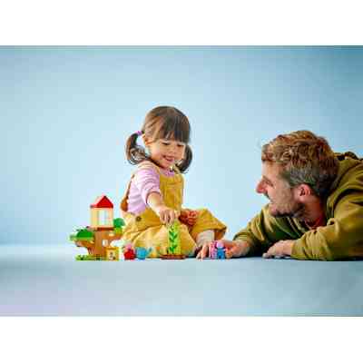 Конструктор LEGO DUPLO Peppa Pig Сад і будиночок на дереві Пеппи (10431) Вінниця