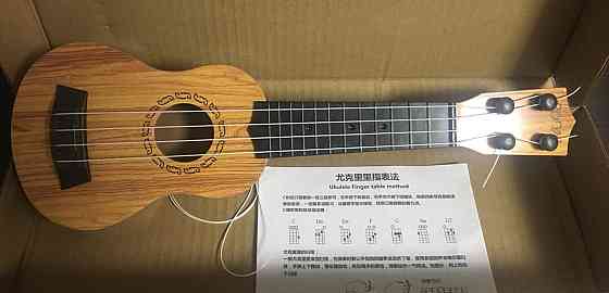 Гітара дитяча іграшка, укулеле для дітей - довжина 35 см, пластик, в комплект входит медиатор Київ