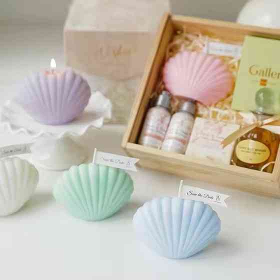 Свеча “Морская ракушка” ручной работы голубого цвета Каменец-Подольский