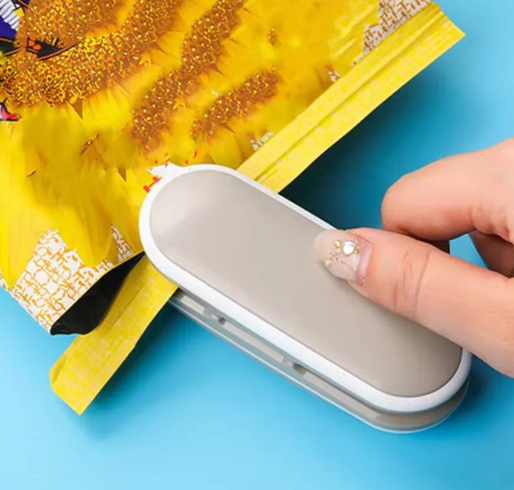 Термо-запайщик мини для пакетов 2 в 1 с ножом 10 см серый с белым Киев - изображение 1