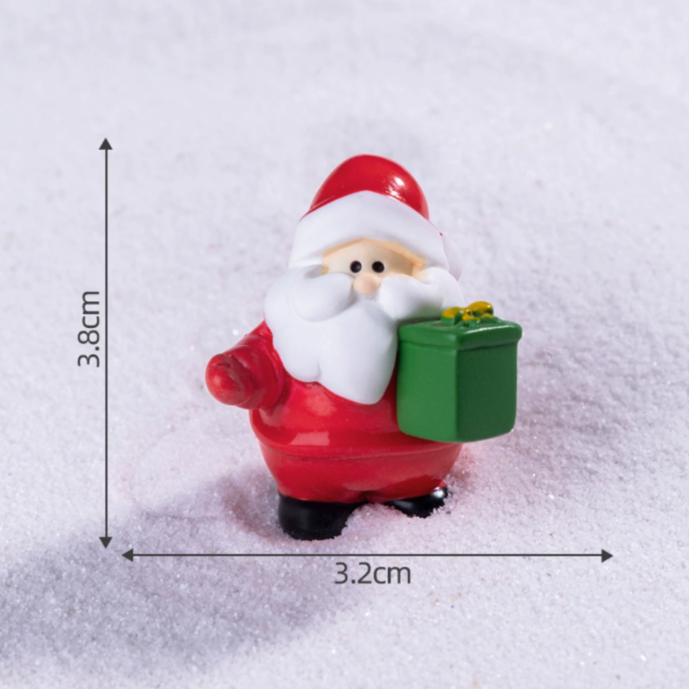 Мініатюрна фігурка Санта з подарунком 3.8 х 3.3 см з серії Свята в мініатюрі Одеса - фото 1