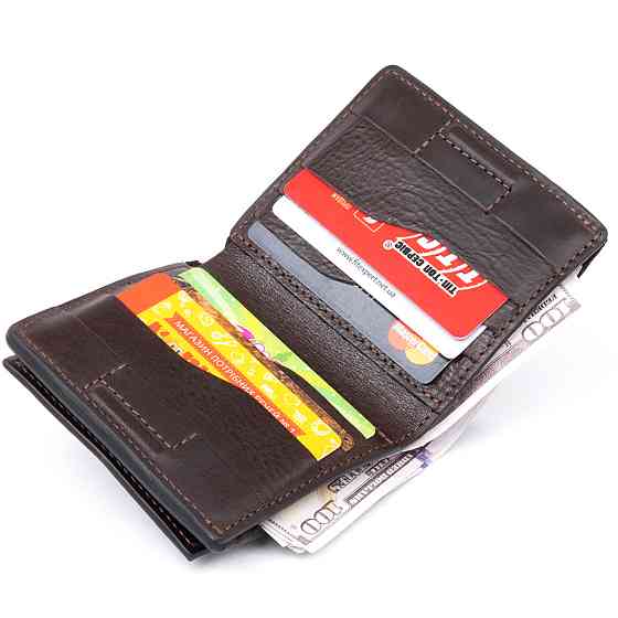 Вертикальне глянсове портмоне з накладною монетницьою GRANDE PELLE 11330 Шоколадне Київ